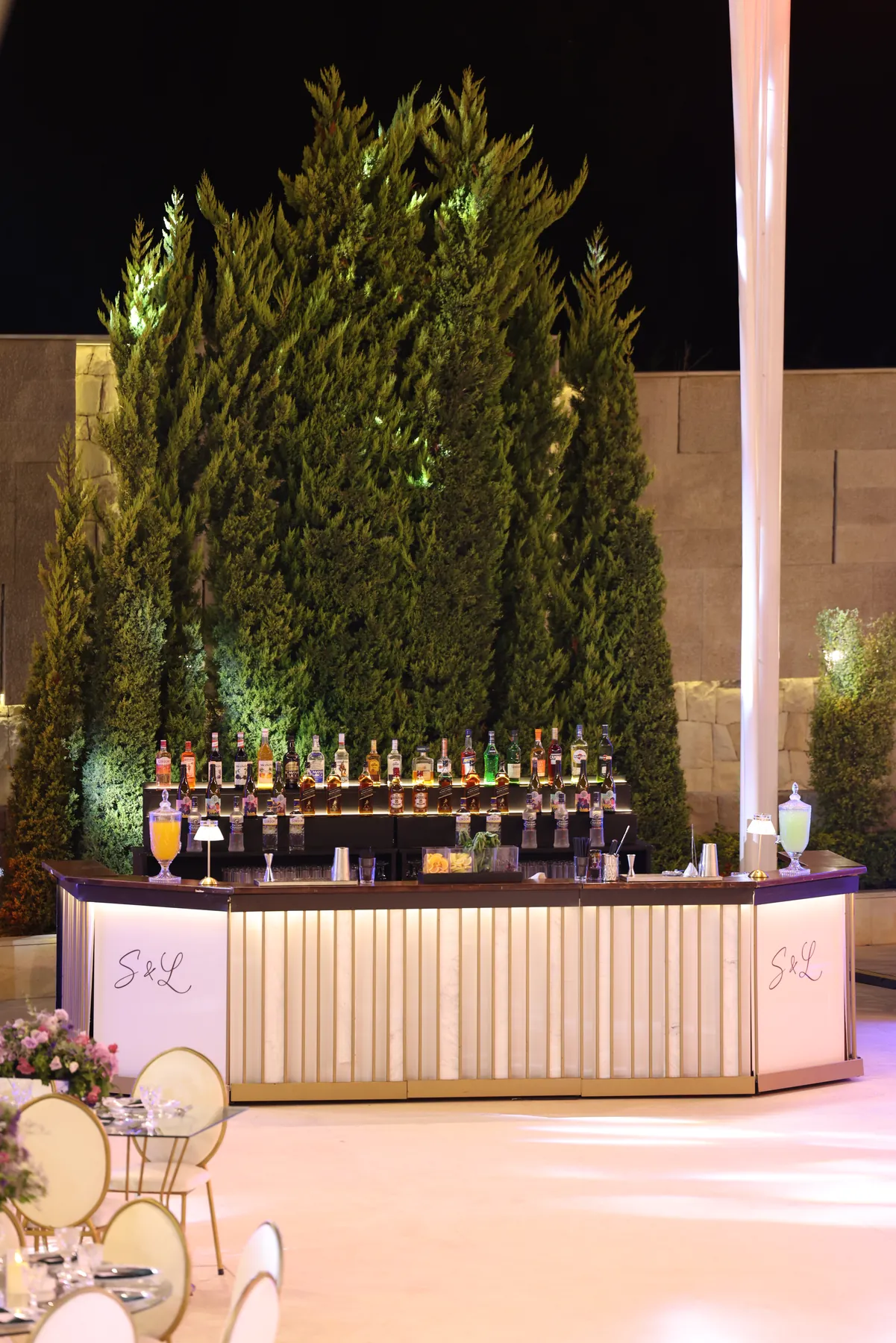 Portrait view of the Pannel Bar glowing at an evening celebration