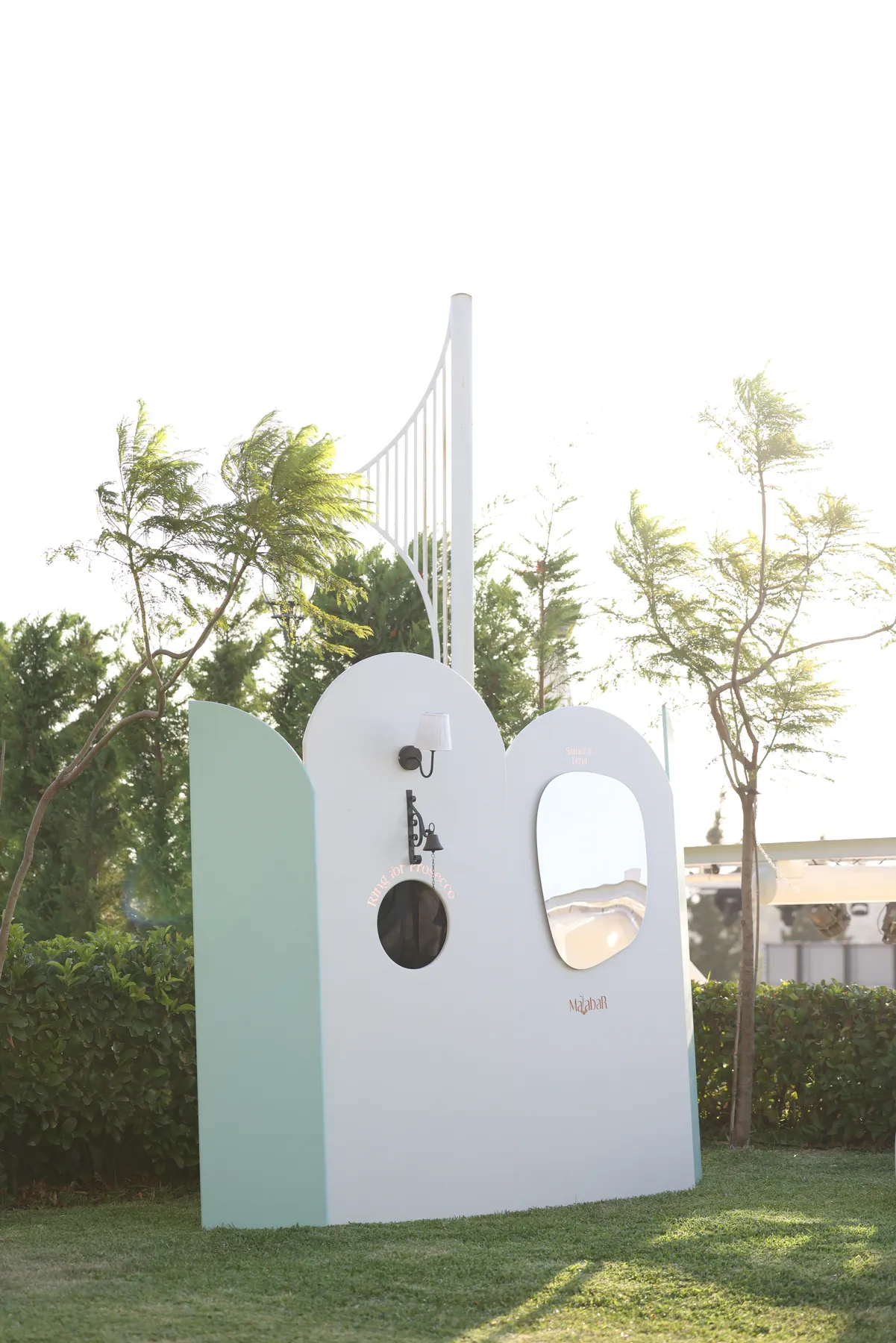 The Ambiance welcome station standing in a sunlit garden